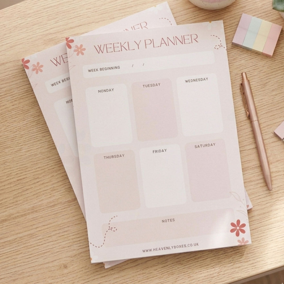 Weekly Planner - A5 Deskpad featuring elegant handwriting and a visible white label, perfect for organizing daily tasks and priorities with mindfulness and style.