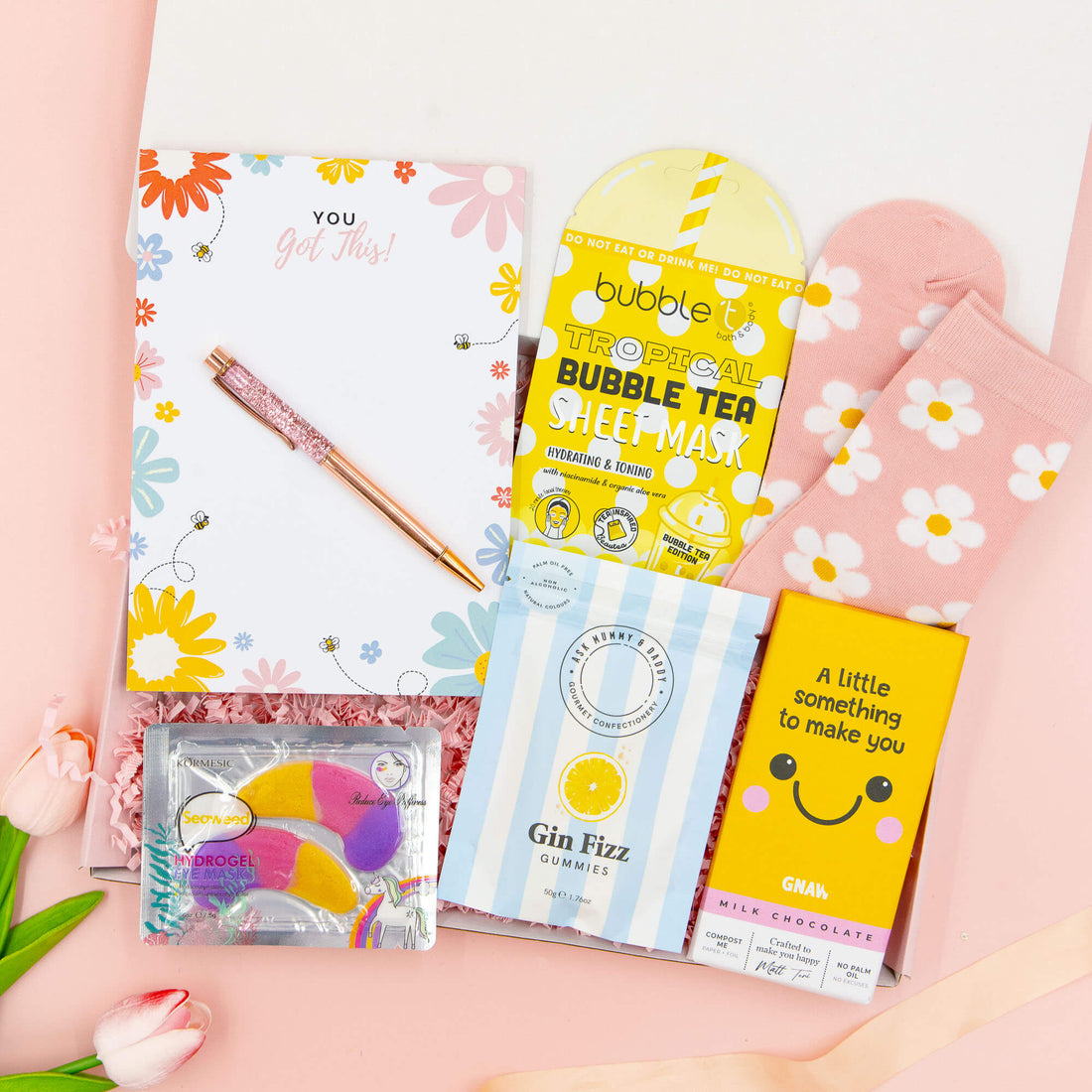 You’ve Got This Box – positive gift for her with chocolate, gin fizz sweets, tropical sheet mask, floral stationery, daisy socks and self-care essentials