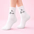 The Bride Socks with black script text, perfect for bridal gifts, featuring elegant design for celebrating the bride-to-be.